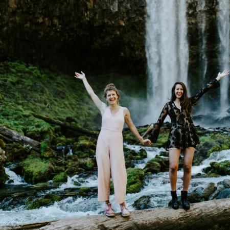 Heather Masson-Forsythe with her sister, Margaux, at a waterfall