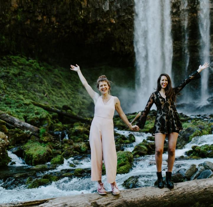 Heather Masson-Forsythe with her sister, Margaux, at a waterfall