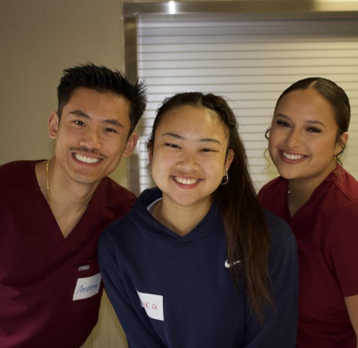 Students pose for a picture during free dental event.