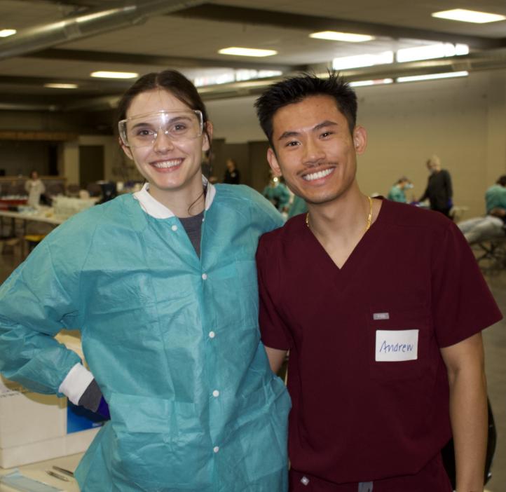 Students pose for a picture during free dental event.