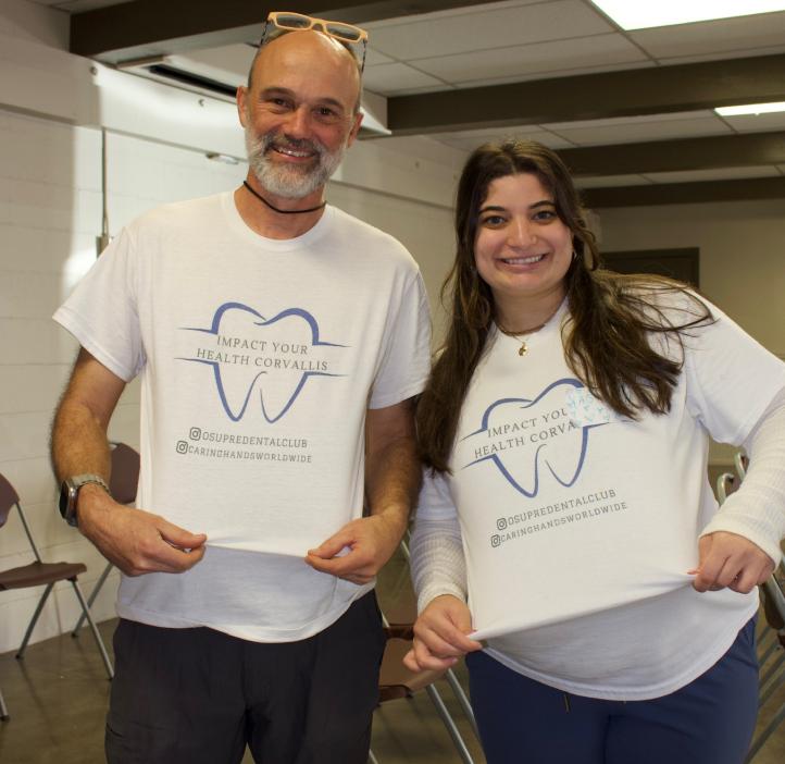 Students pose for a picture during free dental event.